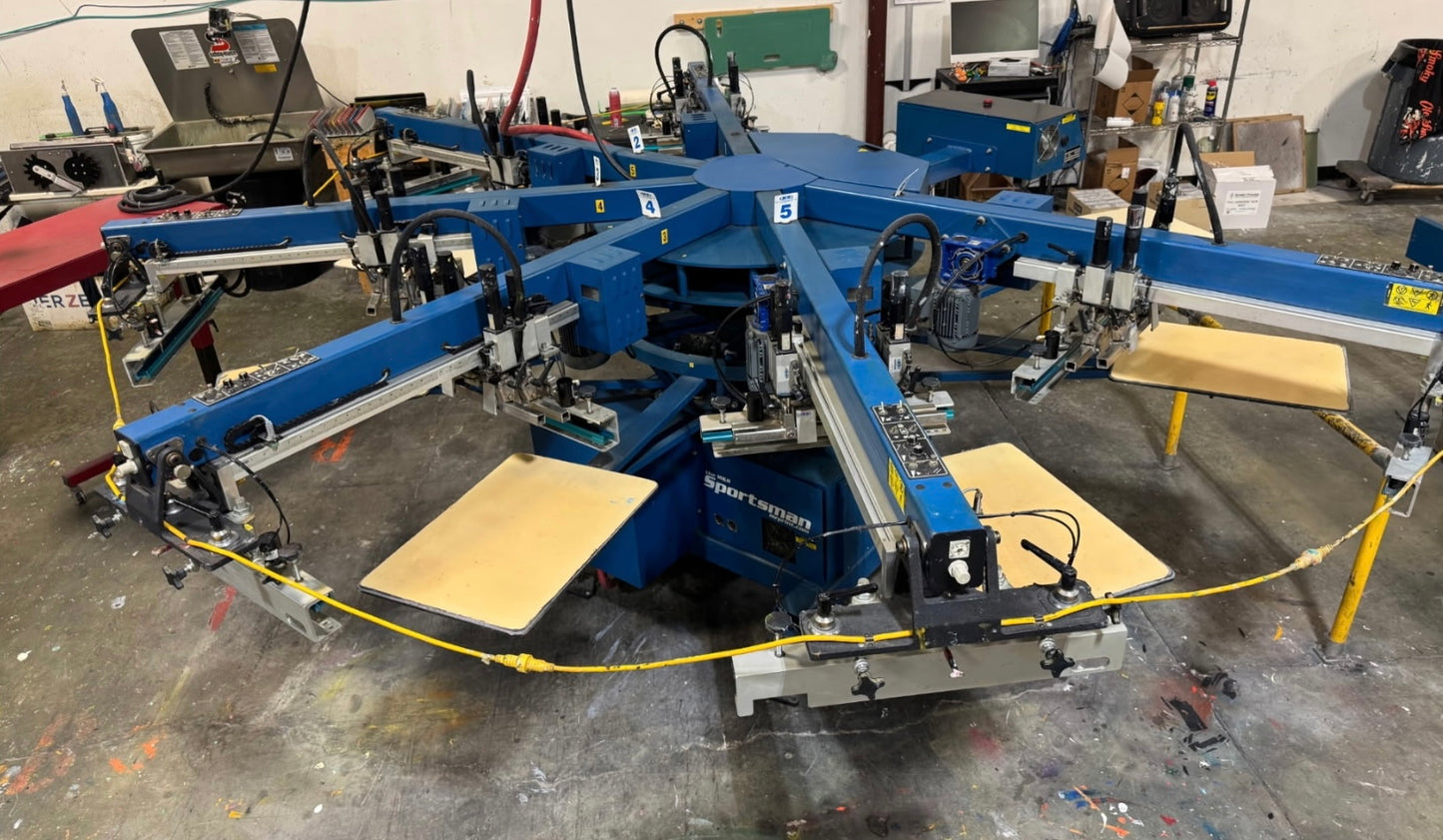 Large blue industrial machine in a workshop setting