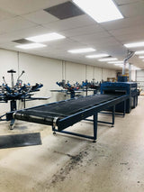 Factory interior with conveyor belts and machinery