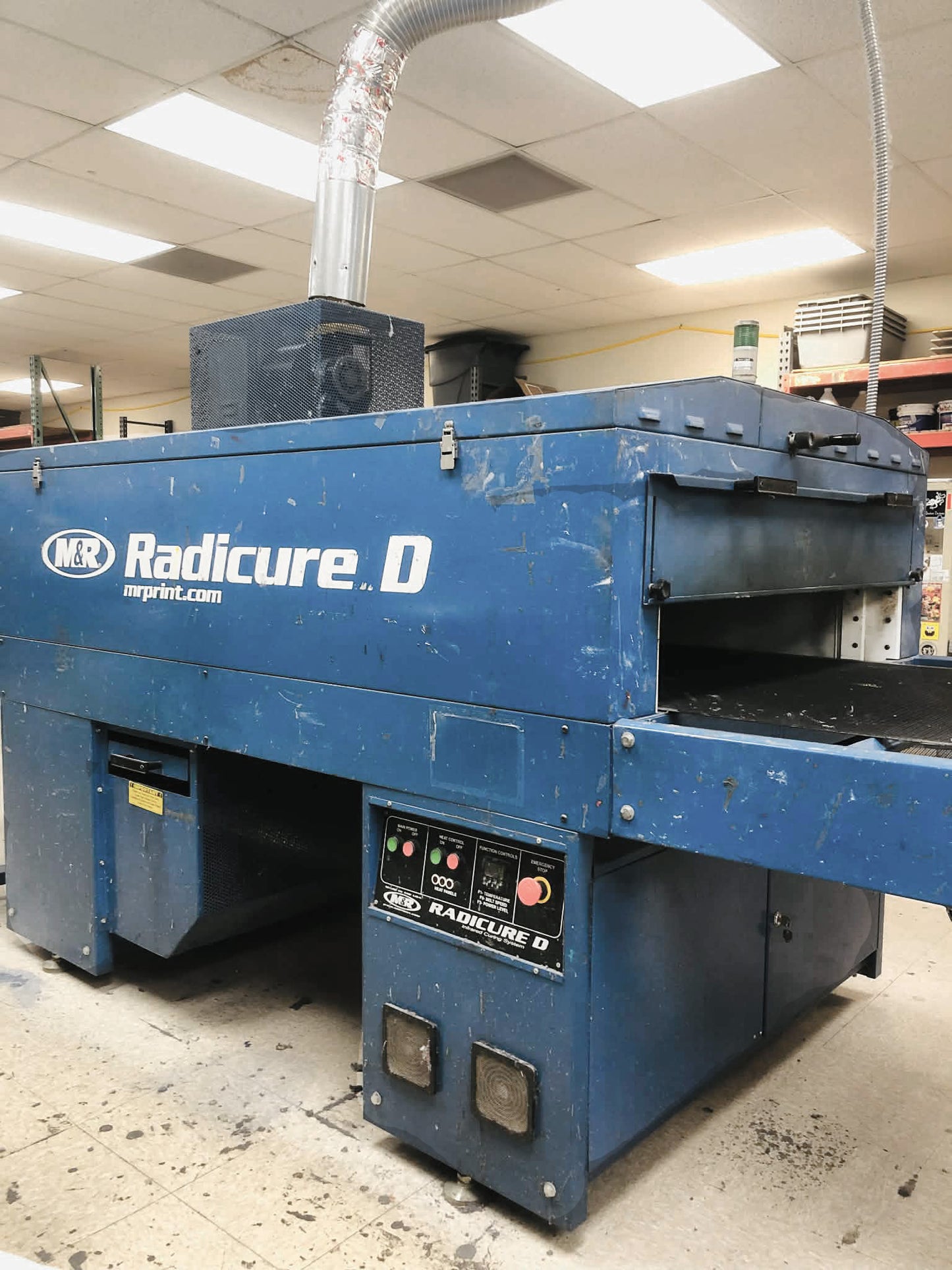 Blue machine labeled 'Radicure D' in an indoor setting