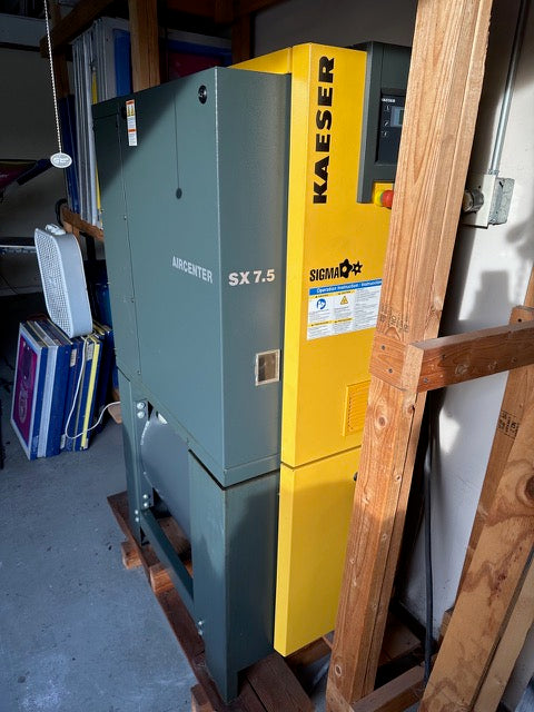 'Kaeser' air compressor, in a warehouse setting.