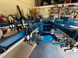 m&r screen printing machine in a shop